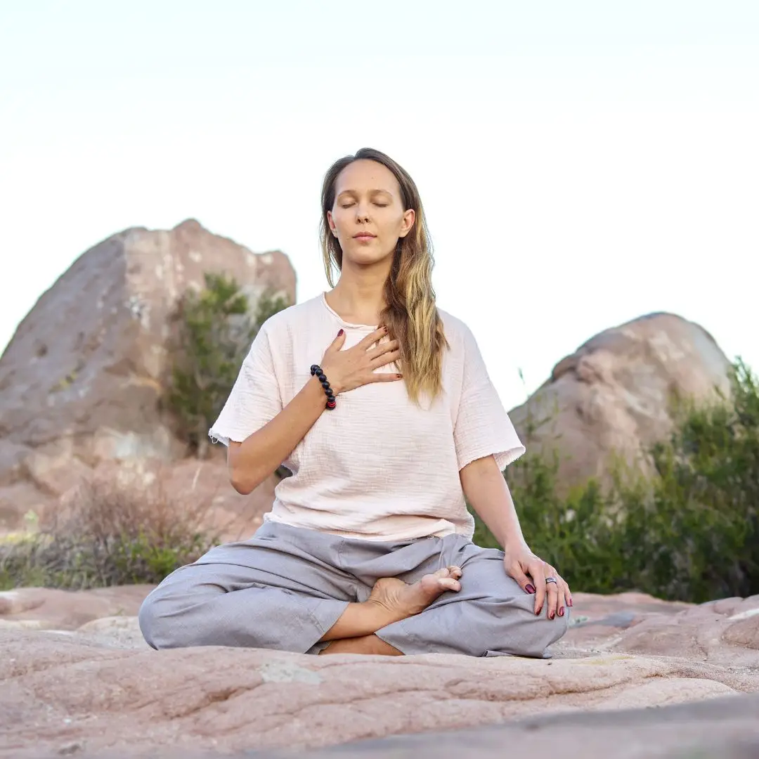 Woman between 30 to 40-years-old at peace, calm, centered, with clarity. Freedom from anxiety, worry, and fear. Aligned with her life purpose.